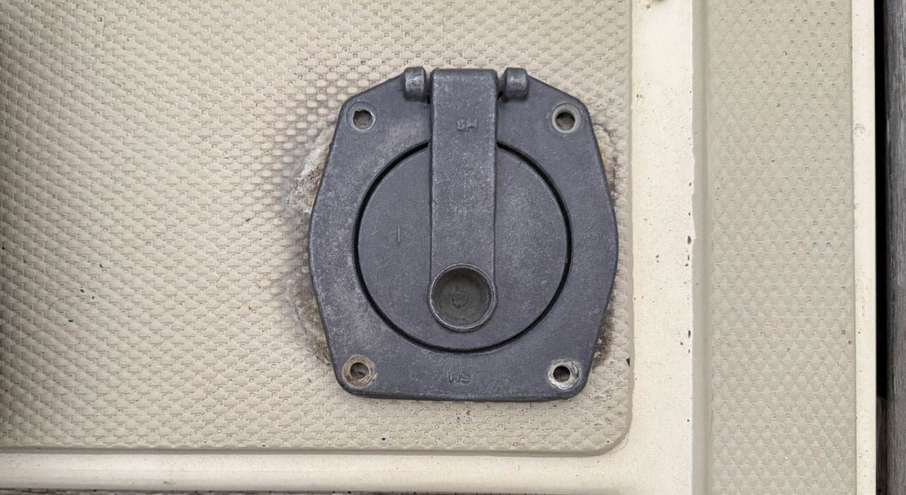 Gusher 10 cover rotated 90 degrees on Titan base, potentially covering old holes