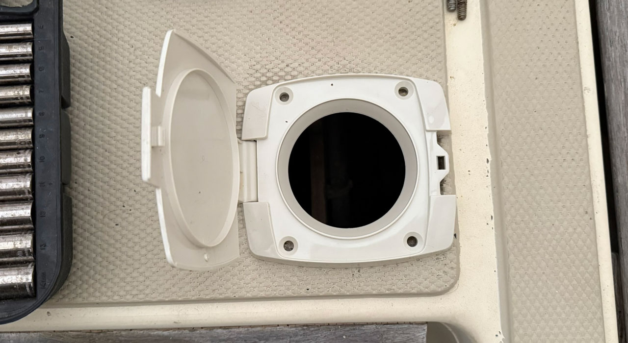 Whale Gusher Titan pump with its standard deck cover installed